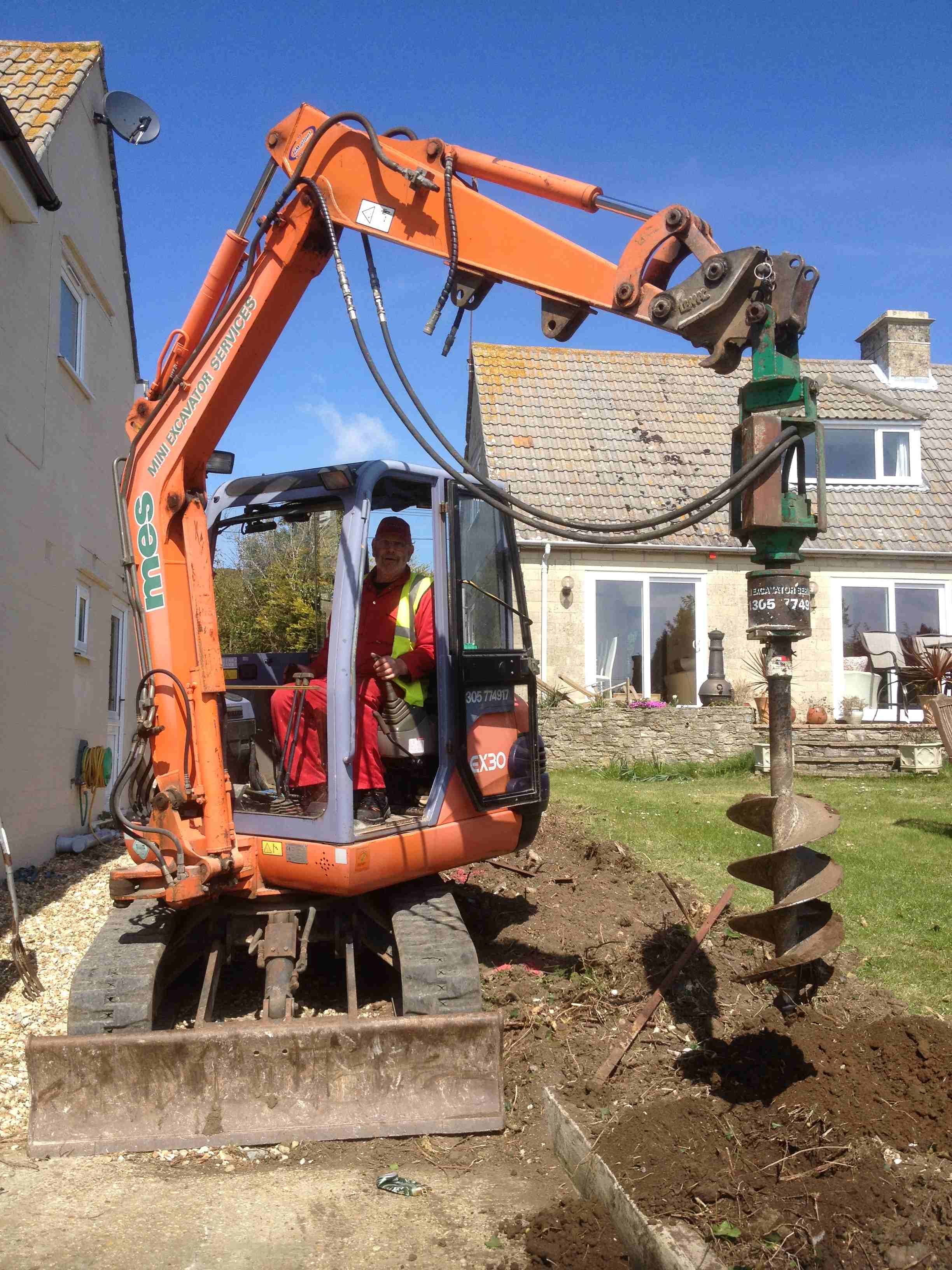 Excavator post discount hole auger